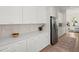 This kitchen has modern stainless steel appliances and white cabinets at 3285 Johnstowne St, Johns Island, SC 29455