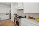 Modern kitchen featuring stainless steel appliances, white cabinets and stone countertops at 3285 Johnstowne St, Johns Island, SC 29455