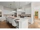 Well-appointed kitchen with a large center island, stainless steel appliances, and modern lighting at 3285 Johnstowne St, Johns Island, SC 29455