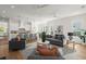 Open-concept living space with a living room connected to a modern kitchen and dining area at 3285 Johnstowne St, Johns Island, SC 29455