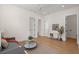 Inviting living room featuring hardwood floors, modern decor, and plenty of natural light at 3285 Johnstowne St, Johns Island, SC 29455