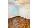 A bedroom with wood flooring, white trim, and a ceiling fan at 332 Southern Sugar Ave, Moncks Corner, SC 29461
