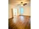 A bright, inviting bedroom featuring wood floors and a spacious closet at 332 Southern Sugar Ave, Moncks Corner, SC 29461