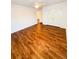 Large bedroom with wood floors, white walls and trim and a double door closet at 332 Southern Sugar Ave, Moncks Corner, SC 29461