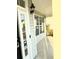 Covered entryway with a glass-paneled door, Ring Doorbell, and sleek black hardware at 332 Southern Sugar Ave, Moncks Corner, SC 29461