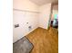 Bright laundry room with tile floors and lots of open shelving at 332 Southern Sugar Ave, Moncks Corner, SC 29461