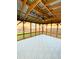 Covered patio featuring an outdoor ceiling fan, tile floor, wood trim and view of the backyard and neighborhood at 332 Southern Sugar Ave, Moncks Corner, SC 29461