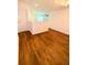 Upstairs landing with wood flooring, white trim, and access to rooms at 332 Southern Sugar Ave, Moncks Corner, SC 29461