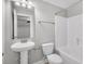 Bathroom features single sink vanity, neutral walls, shower and tub combo at 3408 Salterbeck St, Mount Pleasant, SC 29466
