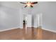 The bedroom has hardwood floors, ceiling fan, and an ensuite bathroom at 3408 Salterbeck St, Mount Pleasant, SC 29466