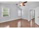 Spacious bedroom with hardwood floors, ceiling fan, and natural light at 3408 Salterbeck St, Mount Pleasant, SC 29466