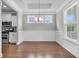 Bright dining room with modern chandelier and access to the kitchen at 3408 Salterbeck St, Mount Pleasant, SC 29466