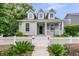 Charming home with a white picket fence and well-manicured landscaping at 3408 Salterbeck St, Mount Pleasant, SC 29466