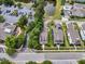 Aerial view of community showcasing landscaping, a central pond, and convenient parking at 3408 Salterbeck St, Mount Pleasant, SC 29466