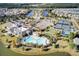 Aerial view of community amenities with tennis courts, a pool, and a clubhouse at 350 Dahlia Row Dr, Summerville, SC 29486