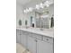 Elegant bathroom boasting a double vanity, ample lighting, and modern design at 350 Dahlia Row Dr, Summerville, SC 29486