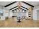 Expansive clubhouse with vaulted ceiling, fireplace, dining area, and comfortable seating, perfect for relaxation and socializing at 350 Dahlia Row Dr, Summerville, SC 29486