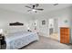 Relaxing bedroom with soft carpet, natural light, and neutral color palette at 350 Dahlia Row Dr, Summerville, SC 29486