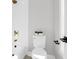 Well-lit bathroom featuring a toilet, tub, shower, and gold fixtures at 397 Parkdale Dr, Charleston, SC 29414