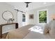 Sunlit bedroom boasting a sliding barn door that leads to an outdoor area at 397 Parkdale Dr, Charleston, SC 29414