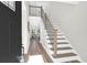 Inviting foyer with stylish staircase, hardwood floors, and natural light streaming through to the adjacent living area at 397 Parkdale Dr, Charleston, SC 29414