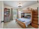 Cozy bedroom featuring a bunk bed with built-in storage and a window at 44 S Basilica Ave, Hanahan, SC 29410