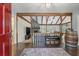 Inviting living room featuring an open floorplan, vaulted ceilings with wood beams, and a cozy fireplace at 44 S Basilica Ave, Hanahan, SC 29410