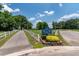 Scenic entrance to Venice Ave. Park with lush greenery and lake views at 44 S Basilica Ave, Hanahan, SC 29410