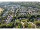 Aerial shot of a neighborhood filled with trees and various homes at 45 Sycamore Ave # 611, Charleston, SC 29407