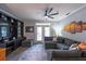 Inviting living room with a large sectional sofa, built-in shelving, and stylish decor at 45 Sycamore Ave # 611, Charleston, SC 29407