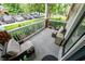 Relaxing front porch with comfortable seating, perfect for enjoying the neighborhood view at 45 Sycamore Ave # 611, Charleston, SC 29407