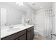 Bathroom with double sink vanity, a mirror, and a shower and tub combo at 451 Spectrum Rd, Summerville, SC 29486