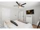 Cozy bedroom with white dresser, soft bedding, and a ceiling fan at 451 Spectrum Rd, Summerville, SC 29486