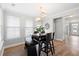 Cozy dining area with modern chandelier lighting at 451 Spectrum Rd, Summerville, SC 29486