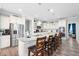 Spacious kitchen featuring a large center island with seating, modern appliances, and ample cabinetry at 451 Spectrum Rd, Summerville, SC 29486
