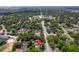 Aerial view of a well-maintained neighborhood with mature trees, nearby schools, and convenient road access at 4932 N Rhett Ave, North Charleston, SC 29405