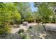 Private backyard oasis with a hammock and outdoor seating area at 4932 N Rhett Ave, North Charleston, SC 29405