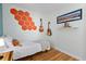 Bedroom with guitars hanging on wall at 4932 N Rhett Ave, North Charleston, SC 29405