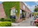 Attractive bakery storefront with ivy-covered brick and outdoor seating at 4932 N Rhett Ave, North Charleston, SC 29405