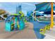 Modern playground with various play structures, slides, and seating areas at 4932 N Rhett Ave, North Charleston, SC 29405