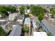 An aerial view showcases this charming home with a landscaped entrance and nearby palm trees at 5 1/2 Kracke St # A, Charleston, SC 29403