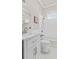Bright bathroom with neutral walls, marble countertop, vanity mirror, and traditional fixtures at 5 1/2 Kracke St # A, Charleston, SC 29403