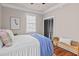 Inviting bedroom features neutral walls, hardwood floors, and an abundance of light at 5 1/2 Kracke St # A, Charleston, SC 29403