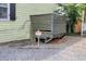 Image of an air conditioning unit outside a yellow home near a gravel parking area at 5 1/2 Kracke St # A, Charleston, SC 29403
