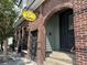 Exterior of the building, showcasing the entrance of Bad Bunnies Coffee and its brick facade at 5 1/2 Kracke St # A, Charleston, SC 29403