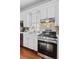 Modern kitchen featuring stainless steel appliances and white marble countertops at 5 1/2 Kracke St # A, Charleston, SC 29403