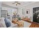 Inviting living area with hardwood floors, stylish decor, an eat-in kitchen and plenty of light at 5 1/2 Kracke St # A, Charleston, SC 29403