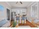 Inviting living area with hardwood floors, stylish decor, an eat-in kitchen and plenty of light at 5 1/2 Kracke St # A, Charleston, SC 29403