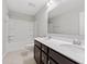 Bathroom showcasing double sinks, a large mirror, and a bath tub at 525 Purple Finch Rd, Summerville, SC 29486