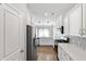 Bright kitchen with stainless steel appliances, quartz counters and shaker style cabinets at 525 Purple Finch Rd, Summerville, SC 29486